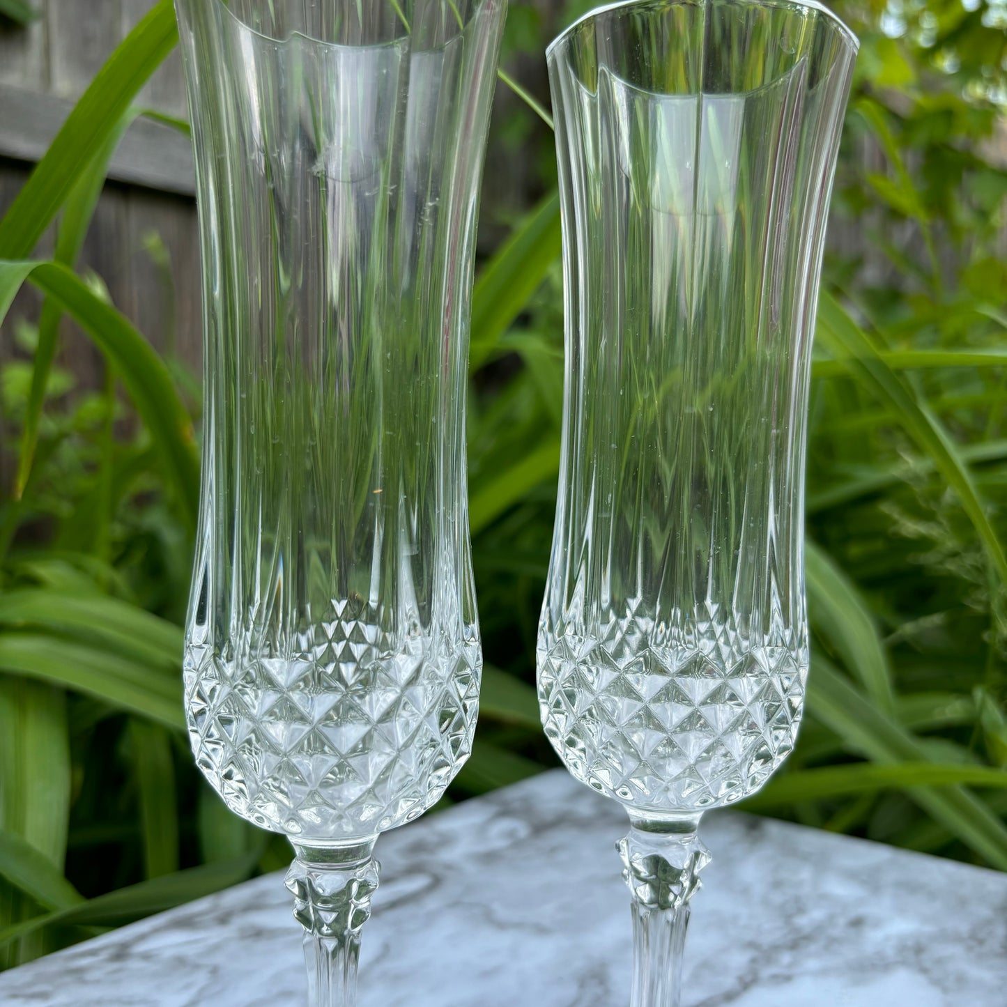 Pair of Cristal D’Arques Longchamp Champagne Flutes